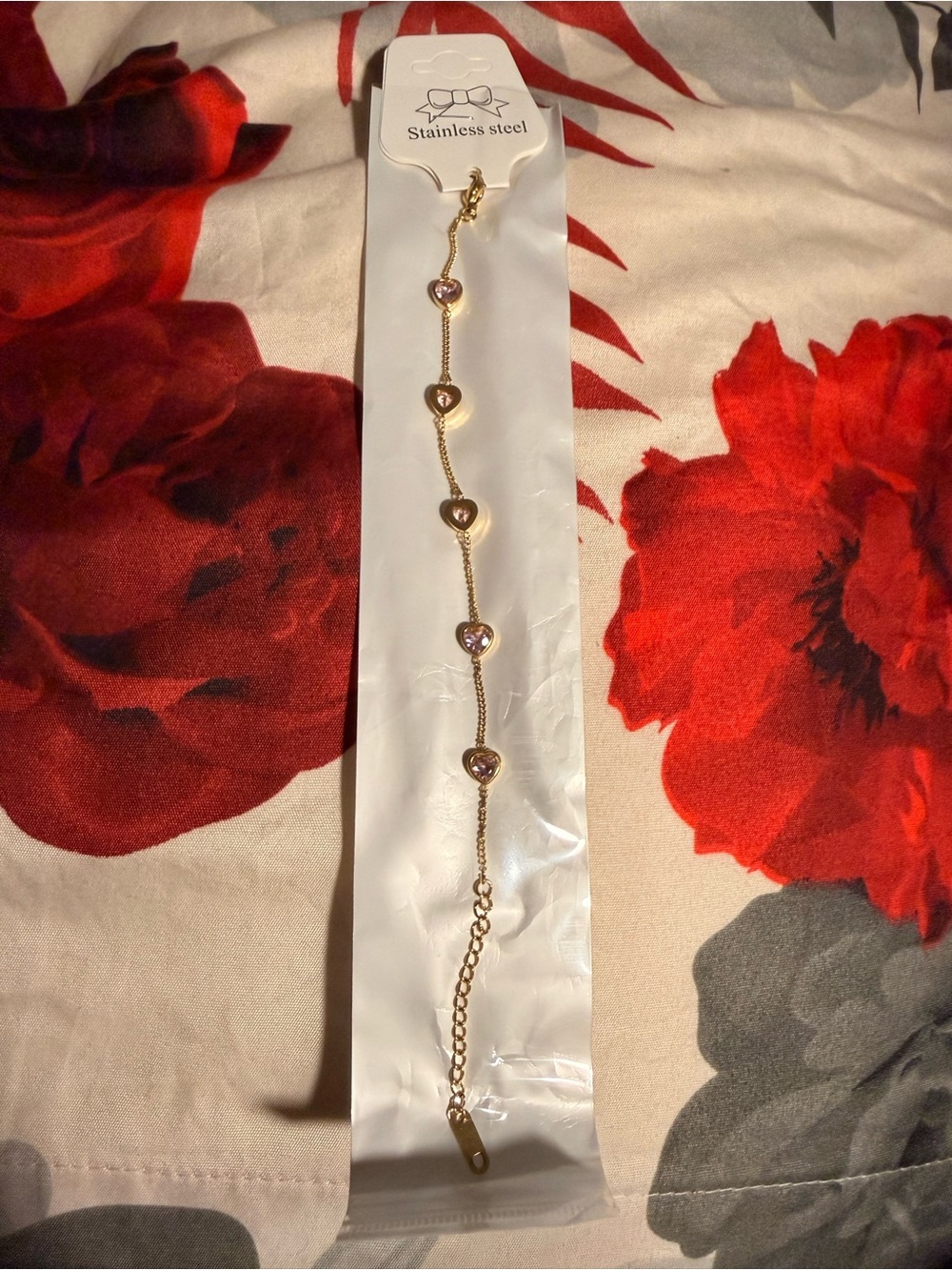 Gold-Tone Heart Bracelet with Pink Crystal Accents